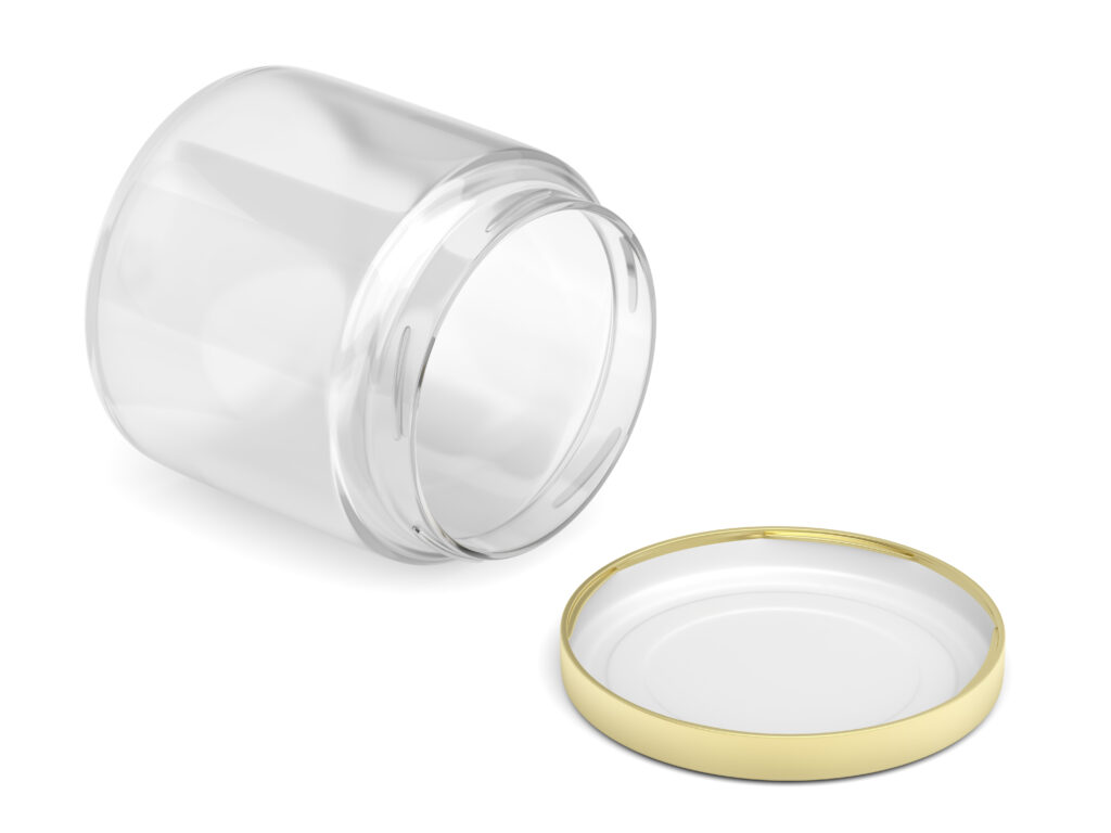 Deckel liegt vor geöffnetem liegenden Einmachglas 